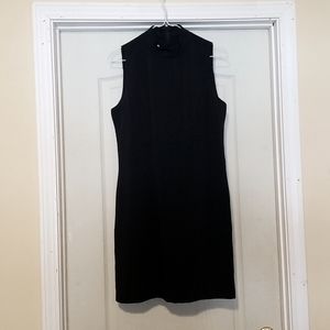 Sleeveless black dress with jacket